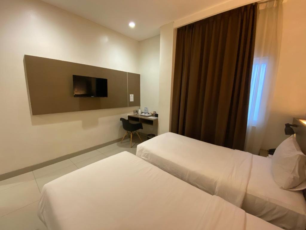 Opi Indah Hotel Palembang Extérieur photo