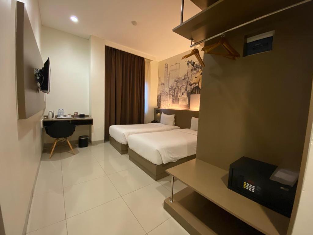 Opi Indah Hotel Palembang Extérieur photo