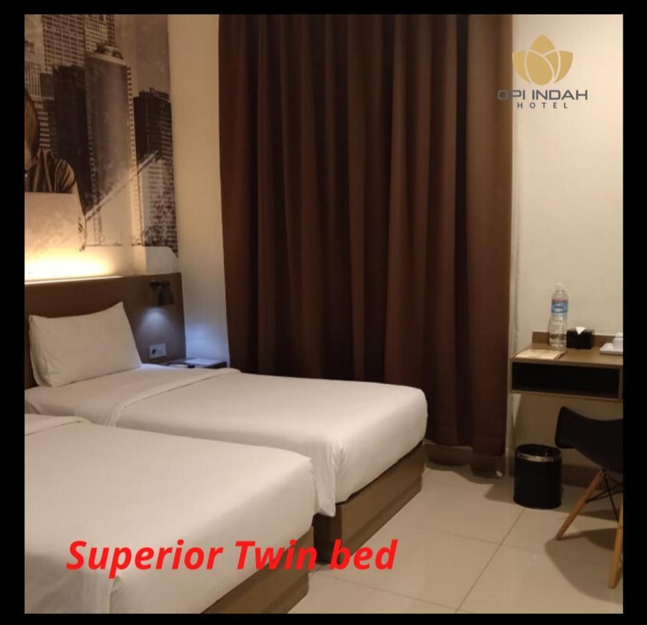 Opi Indah Hotel Palembang Extérieur photo