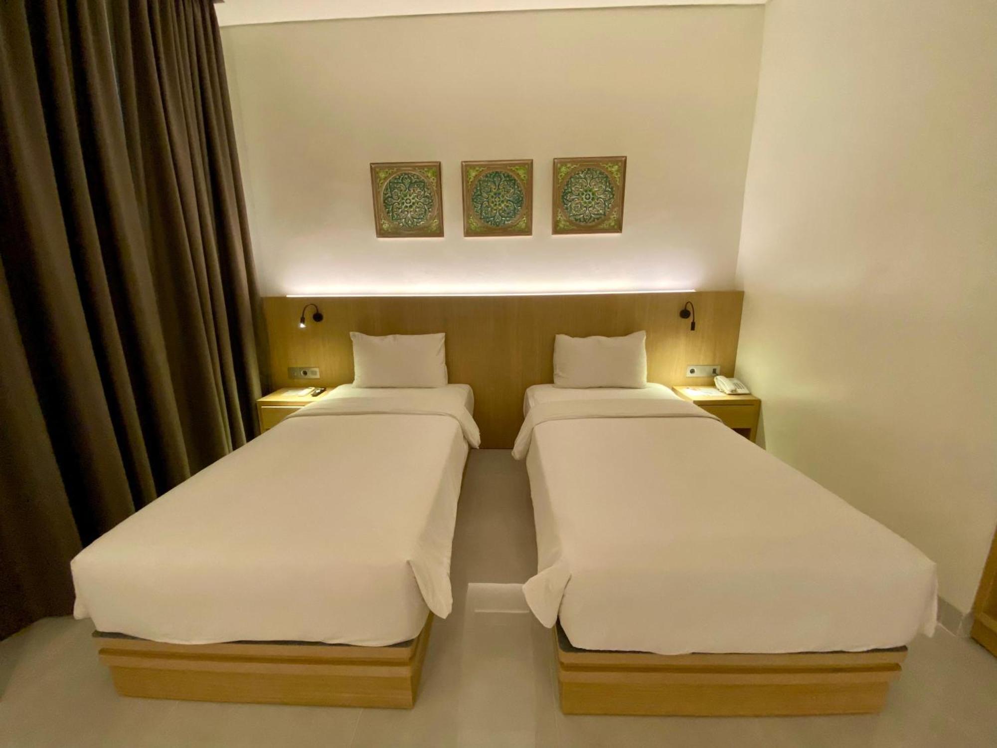 Opi Indah Hotel Palembang Extérieur photo